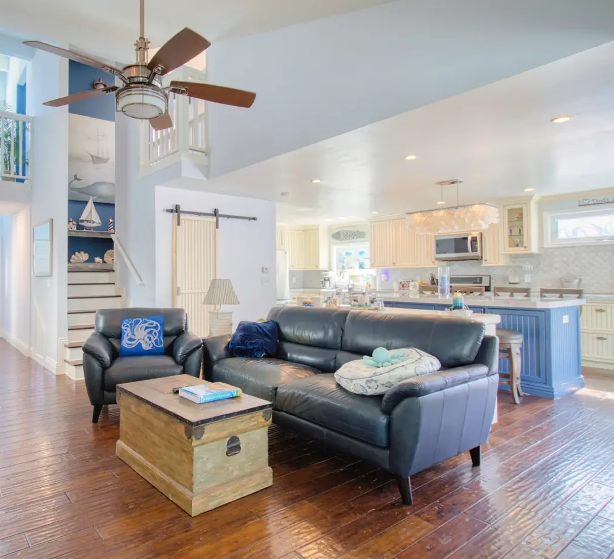 Whole-home remodel in Orange County — entry, living room and open kitchen after a full interior renovation by Laguna Bay Developing