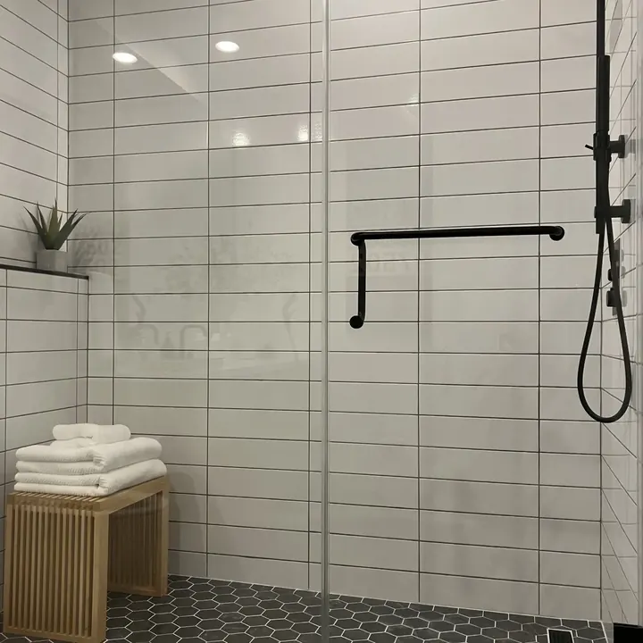 Walk-in shower with large-format tile