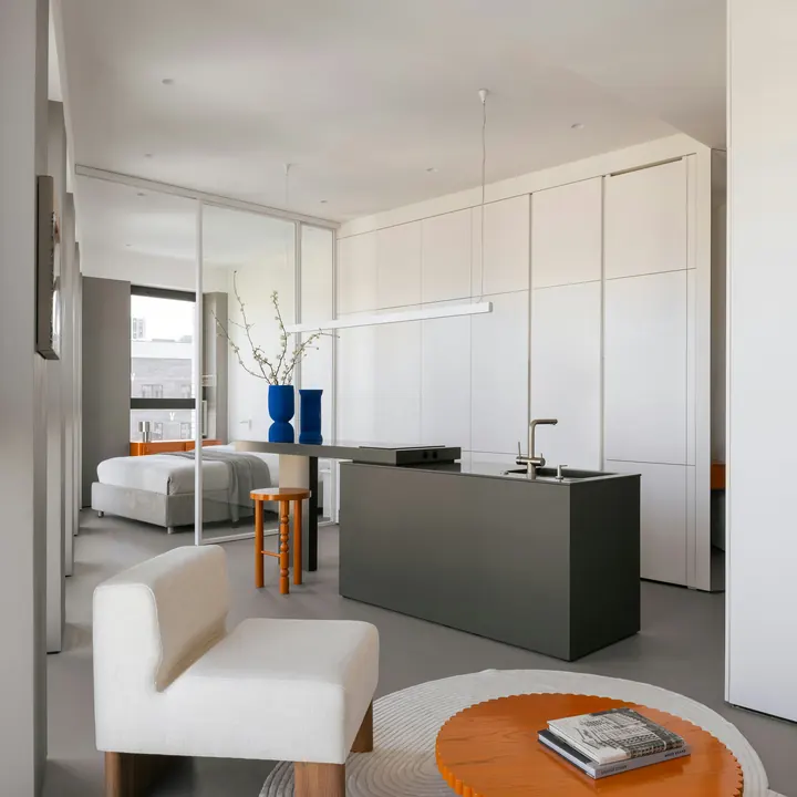 Bright bedroom and sitting area after renovation